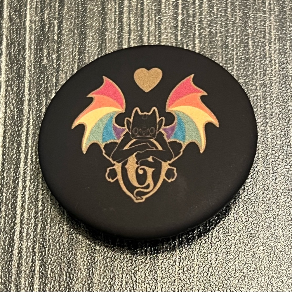 Gideon bakehouse gargoyle pride button. Approx 1 1/2 inches.